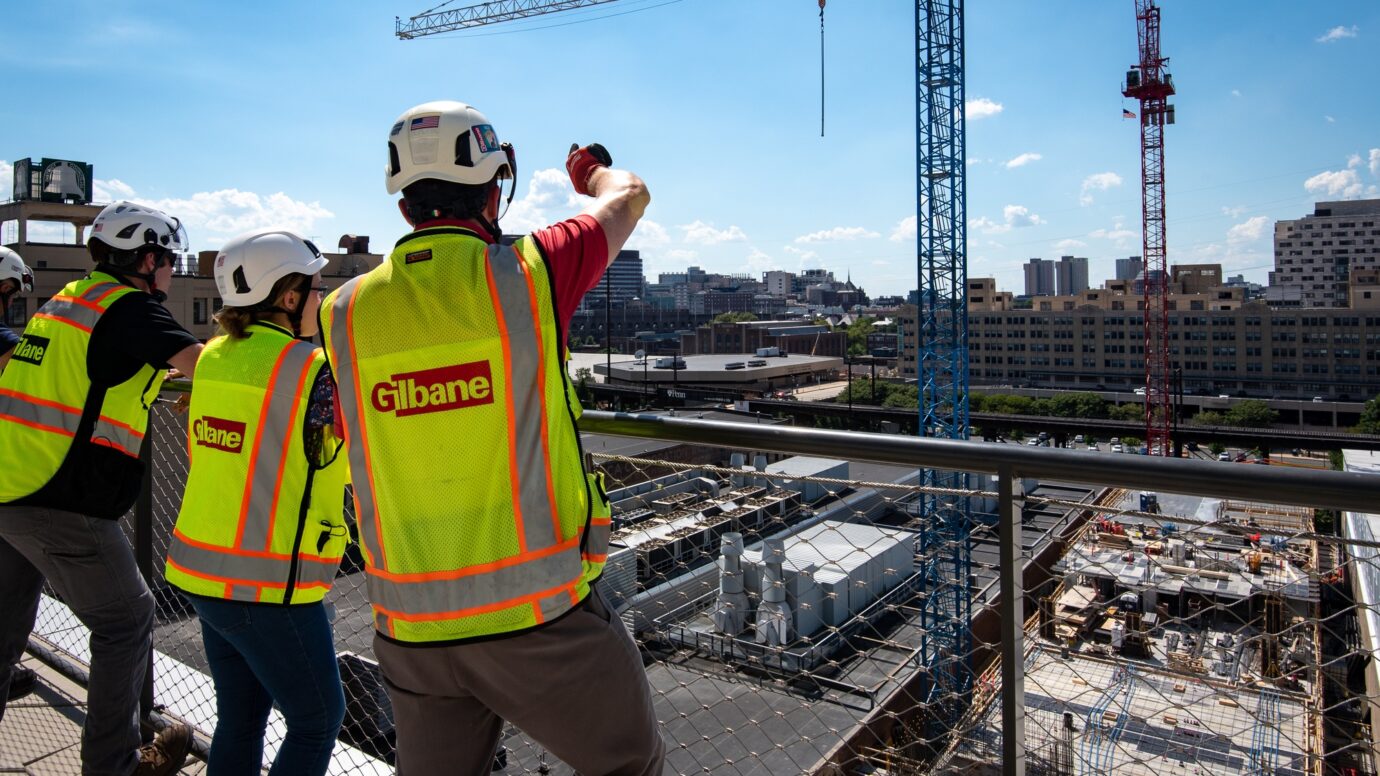 gilbane building company construction workers at construction site